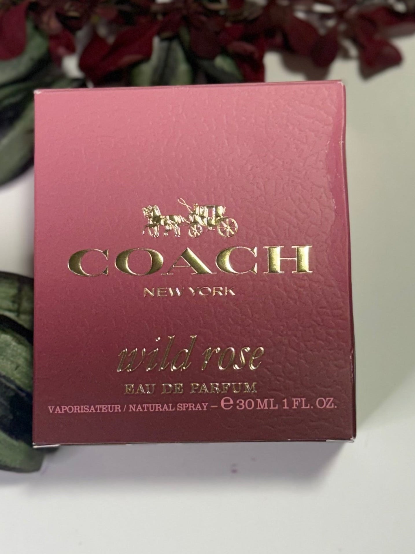 Coach Wild Rose